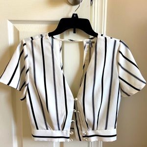 Cropped white top with black vertical stripes